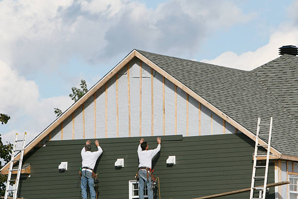 Professional Siding Installation technician working in Bainbridge, OH